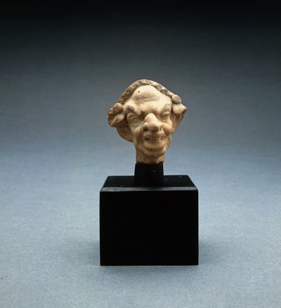 Grotesque Head of a Woman by Greek